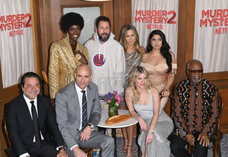 Photo for LOS ANGELES, CA. March 28, 2023:  Enrique Arce, Jodie Turner-Smith, Mark Strong, Adam Sandler, Jennifer Aniston, Melanie Laurent, Kuhoo Verma and and John Kani at the premiere for Murder Mystery 2 at the Regency Village Theatre - Royalty Free Image