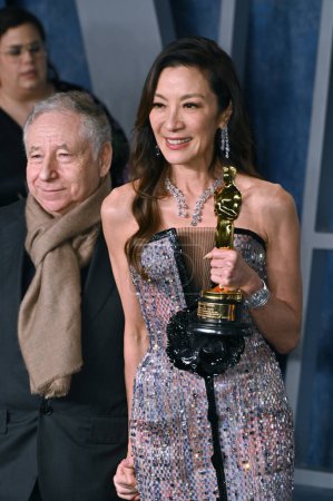 Photo for BEVERLY HILLS, CA. March 13, 2023:  Jean Todt and Michelle Yeoh at the 2023 Vanity Fair Oscar Party at the Wallis Annenberg Center - Royalty Free Image