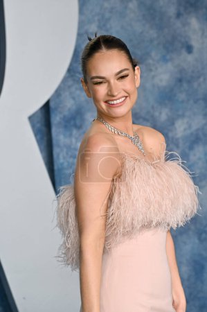 Photo for BEVERLY HILLS, CA. March 12, 2023:  Lily James at the 2023 Vanity Fair Oscar Party at the Wallis Annenberg Center - Royalty Free Image