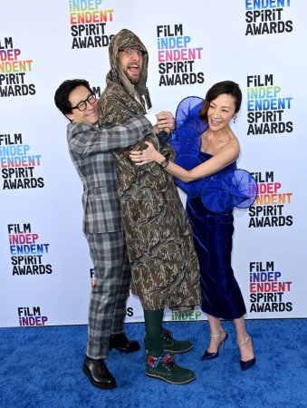 Photo for SANTA MONICA, CA. March 04, 2023:  Ke Huy Quan, Daniel Scheinert and Michelle Yeoh at the Film Independent Spirit Awards 2023 in Santa Monica - Royalty Free Image