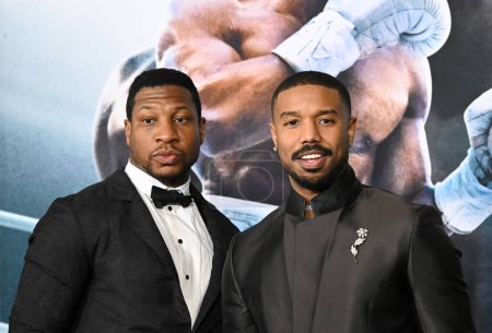 Photo for LOS ANGELES, CA. February 27, 2023:  Jonathan Majors and Michael B. Jordan at the premiere for Creed III at the TCL Chinese Theatre, Hollywood - Royalty Free Image