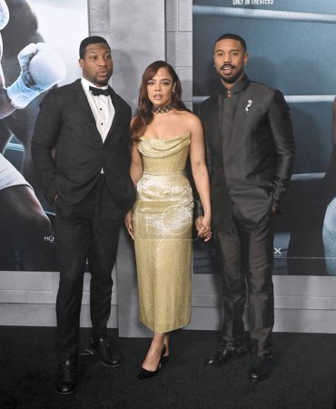Photo for LOS ANGELES, CA. February 27, 2023:  Jonathan Majors, Tessa Thompson and Michael B. Jordan at the premiere for Creed III at the TCL Chinese Theatre, Hollywood - Royalty Free Image