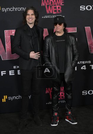 Photo for LOS ANGELES, USA. February 12, 2024: Nick Simmons & Gene Simmons at the premiere for Madame Web at the Regency Bruin Theatre - Royalty Free Image