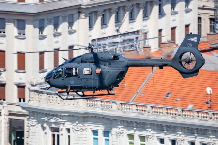 Photo for Budapest, Hungary - August 15, 2022: Hungarian Air Force Airbus Helicopters H145M military utility helicopter. Flight operation. Aviation industry and rotorcraft. Transport and airlift. Fly and flying - Royalty Free Image