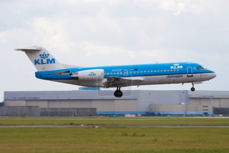 Photo for Amsterdam, Netherlands - August 15, 2014: KLM passenger plane at airport. Schedule flight travel. Aviation and aircraft. Air transport. Global international transportation. Fly and flying. - Royalty Free Image