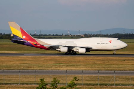 Photo for Vienna, Austria - May 20, 2018: Asiana Cargo Boeing 747-400 HL7620 cargo plane arrival and landing at Vienna Airport - Royalty Free Image
