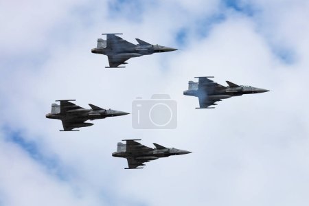 Photo for Budapest, Hungary - August 20, 2021: Hungarian SAAB JAS 39 Gripen Military fighter jet plane. Air force flight operation. Aviation and aircraft. Air defense. Military industry. Fly and flying. - Royalty Free Image