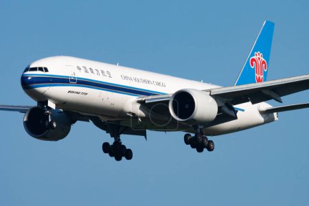 Photo for Amsterdam, Netherlands - April 15, 2015: China Southern cargo plane at airport. Air freight and shipping. Aviation and aircraft. Transport industry. Global international transportation. Fly and flying. - Royalty Free Image