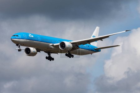 Photo for Amsterdam / Netherlands - August 14, 2014: KLM Royal Dutch Airlines Boeing 777-300ER PH-BVI passenger plane arrival and landing at Amsterdam Schipol Airport - Royalty Free Image