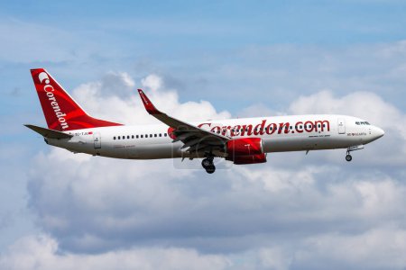 Photo for Amsterdam, Netherlands - August 14, 2014: Corendon Airlines passenger plane at airport. Schedule flight travel. Aviation and aircraft. Air transport. Global international transportation. Fly and flying. - Royalty Free Image