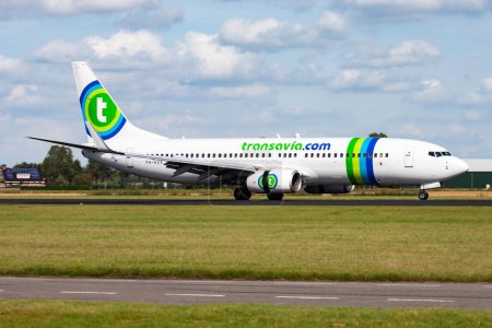 Photo for Amsterdam, Netherlands - August 14, 2014: Transavia passenger plane at airport. Schedule flight travel. Aviation and aircraft. Air transport. Global international transportation. Fly and flying. - Royalty Free Image