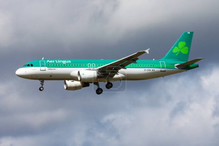 Photo for Amsterdam, Netherlands - August 14, 2014: Aer Lingus passenger plane at airport. Schedule flight travel. Aviation and aircraft. Air transport. Global international transportation. Fly and flying. - Royalty Free Image