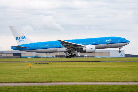 Photo for Amsterdam / Netherlands - August 16, 2014: KLM Royal Dutch Airlines Boeing 777-200 PH-BQI passenger plane arrival and landing at Amsterdam Schipol Airport - Royalty Free Image