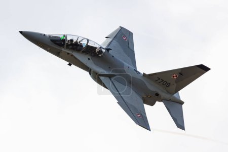 Photo for Radom, Poland - August 24, 2023: Polish Air Force Leonardo M-346 Master Bielik trainer jet plane flying. Aviation and military aircraft. - Royalty Free Image