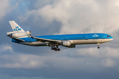 Photo for Amsterdam, Netherlands - August 16, 2014: KLM passenger plane at airport. Schedule flight travel. Aviation and aircraft. Air transport. Global international transportation. Fly and flying. - Royalty Free Image
