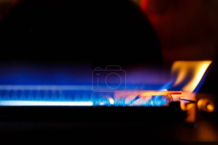 Photo for The problem of gas, lighting a fire in a gas boiler. - Royalty Free Image