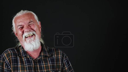 Foto de El viejo se ríe tan felizmente Foto - Imagen libre de derechos