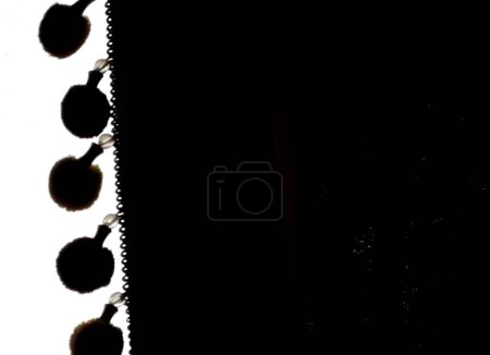 Photo for Black and white image of curtain with bobbled fringe with copy space. High quality photo - Royalty Free Image