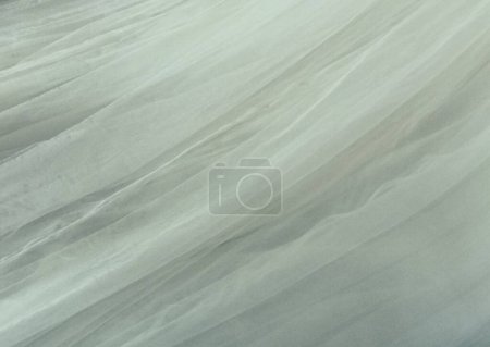 Photo for Grey off white coloured draped textured voile fabric background with space for copy. High quality photo - Royalty Free Image