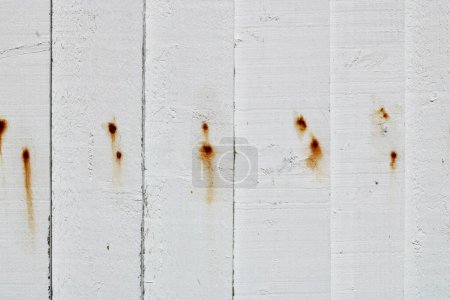 Photo for White wooden panelled fence with rust stains and space for copy. High quality photo - Royalty Free Image