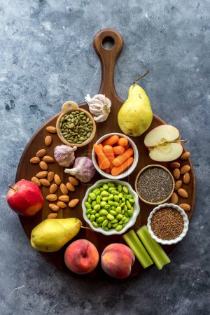 A Top down view of a variety of nutritious plant based foods. 