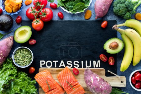 Photo for A healthy assortment of food that are high in the mineral potassium. - Royalty Free Image