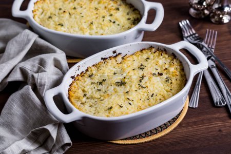 Photo for Homemade Shepherds Pie topped with mashed cauliflower and sprinkled with fresh thyme leaves. - Royalty Free Image