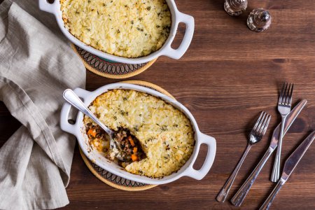 Photo for Top down view of servings of cauliflower shepherds pie, ready for eating. - Royalty Free Image
