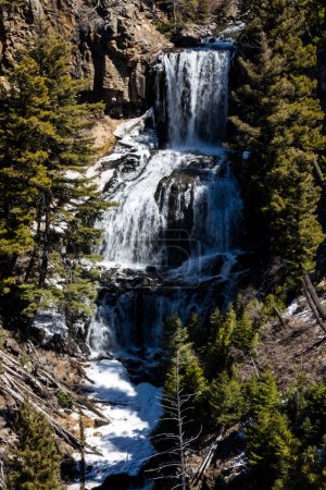 A view of Undine Waterfalls in Yellowstone National Park on a sunny day. 