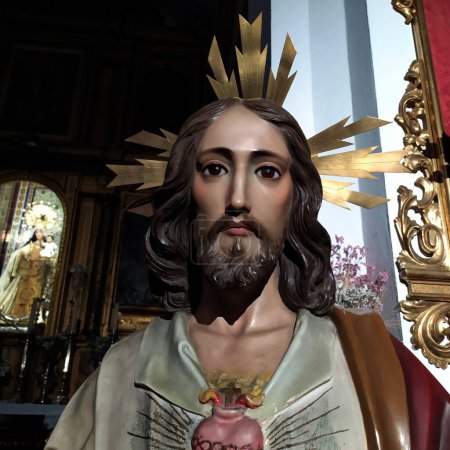Foto de Sacred heart of Jesus with virgin of carmen in the background inside a church located in Prado del Rey, province of Cadiz, Andalucia, Spain, Europe. - Imagen libre de derechos