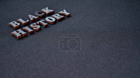 Photo for Inscription text Black History Month on dark grey isolated background close up. Celebrating the African American Conceptual Holiday for Equality - Royalty Free Image