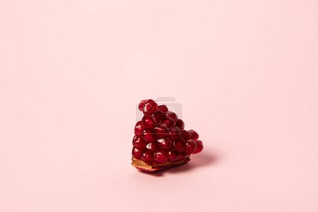 Photo for Ripe pomegranate fruits on pink background - Royalty Free Image
