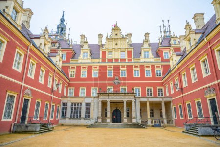 The baroque-style front entrance of the Chateau Bad Muskau in Saxony, showcasing its ornate architecture and grandeur. Germany