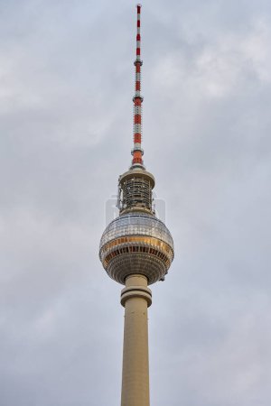Photo for TV tower located at Alexanderplatz in Berlin, Germany against cloudy sky - Royalty Free Image