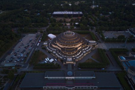 Centennial Hall in Wroclaw, Poland. Aerial view of people resting near multimedia fountain at Hala Stulecia