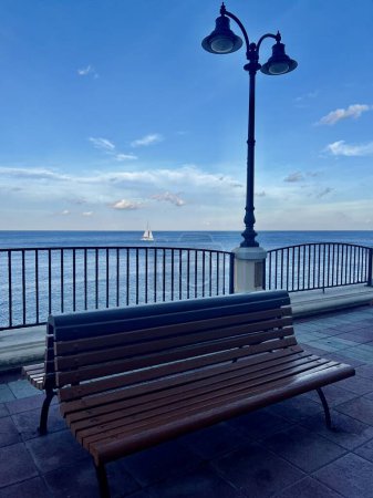 Benches and lampposts on the promenade by the sea at Sliema  Malta