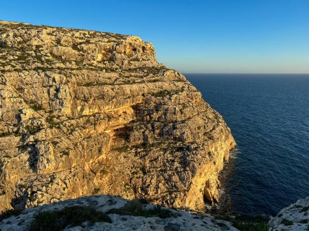 Blue Grotto is a complex of seven caves found along the southern coast of Malta. Wied iz-Zurrieq harbour and Blue Grotto sea caves are located on the coastline opposite to the small  islet of Filfla.
