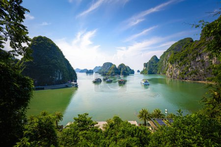 Ha Long Bay landscape with tourist boats and beautiful mountains. It has been recognized by Unesco as a World Natural Heritage many times. It located in Ha Long, Quang Ninh province, Vietnam.