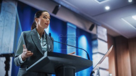 Photo for Portrait of Organization Female Representative Speaking at Press Conference in Government Building. Press Office Representative Delivering a Speech at Summit. Minister Speaking to Congress Hearing. - Royalty Free Image