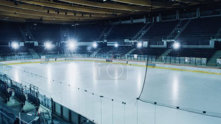 Photo for Empty Professional Ice Hockey Arena with Turned on Shining Lights. Big Rink Stadium Ready for the Championship to Begin. - Royalty Free Image