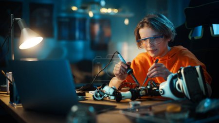 Photo for Smart Young Boy in Safety Glasses Mixes Chemicals in Beakers at Home. Teenager Conducting Educational Science Hobby Experiments, Doing Interesting Biology Homework in His Room. - Royalty Free Image