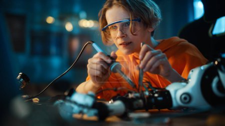 Photo for Smart Young Boy in Safety Glasses Mixes Chemicals in Beakers at Home. Teenager Conducting Educational Science Hobby Experiments, Doing Interesting Biology Homework in His Room. - Royalty Free Image