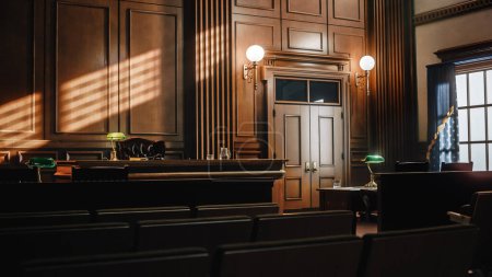 Photo for Empty American Style Courtroom. Supreme Court of Law and Justice Trial Stand. Courthouse Before Civil Case Hearing Starts. Grand Wooden Interior with Judge's Bench, Defendant's and Plaintiff's Tables. - Royalty Free Image