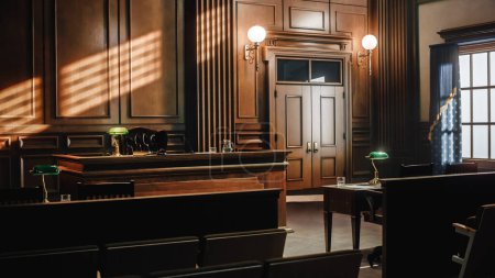 Photo for Empty American Style Courtroom. Supreme Court of Law and Justice Trial Stand. Courthouse Before Civil Case Hearing Starts. Grand Wooden Interior with Judge's Bench, Defendant's and Plaintiff's Tables. - Royalty Free Image