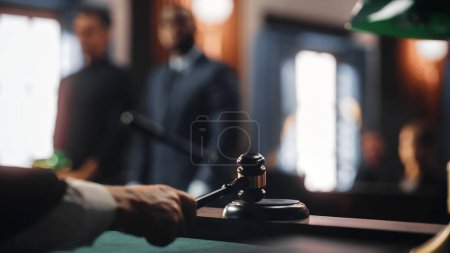 Photo for Cinematic Court of Law and Justice Trial: Judge Ruling Out a Positive Decision in a Civil Family Case, Close Up of a Striking Gavel to End Hearing. - Royalty Free Image
