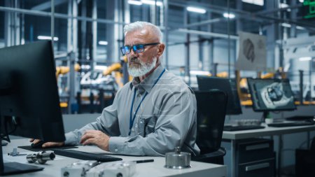 Photo for Car Factory Office: Portrait of Male Engineer Working on Computer. Automated Robot Arm Assembly Line Manufacturing Electric Vehicles. Technician Monitoring Electronics Production Conveyor. - Royalty Free Image