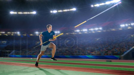 Stabhochsprung: Männlicher Profi-Athlet läuft bei WM mit Stange über Reck Wettkampfschuss im großen Stadion mit sportlicher Erfolgserfahrung