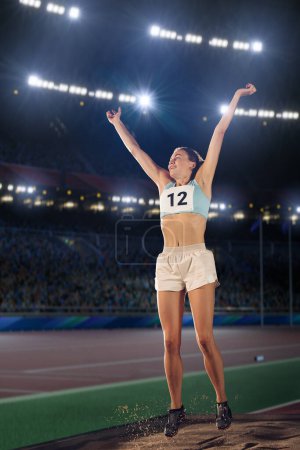 Photo for Portrait of Professional Female Athlete on Stadium Happily Celebrating World Record with Raised Hands on Sports Championship. Determination, Effort, Motivation, Inspiration are Key of Success Story - Royalty Free Image