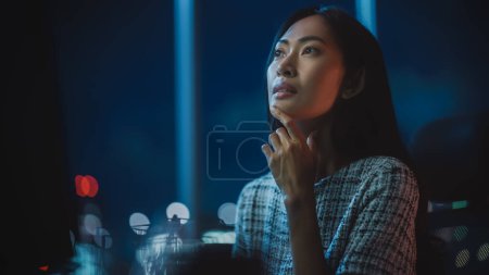 Photo for Close Up Portrait of Financial Analyst Working on Computer with Multi-Monitor Workstation with Real-Time Stocks, Commodities and Exchange Market Charts. Businesswoman at Work in Investment Agency. - Royalty Free Image