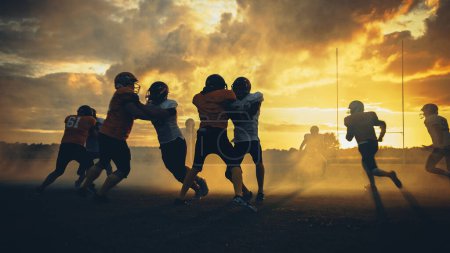 Photo for Two Professional American Football Teams Stand Opposite Each Other, Ready to Start the Game. Defense and Offense Prepare to Fight for the Ball with Desire to Score Points and the Goal and Win. - Royalty Free Image